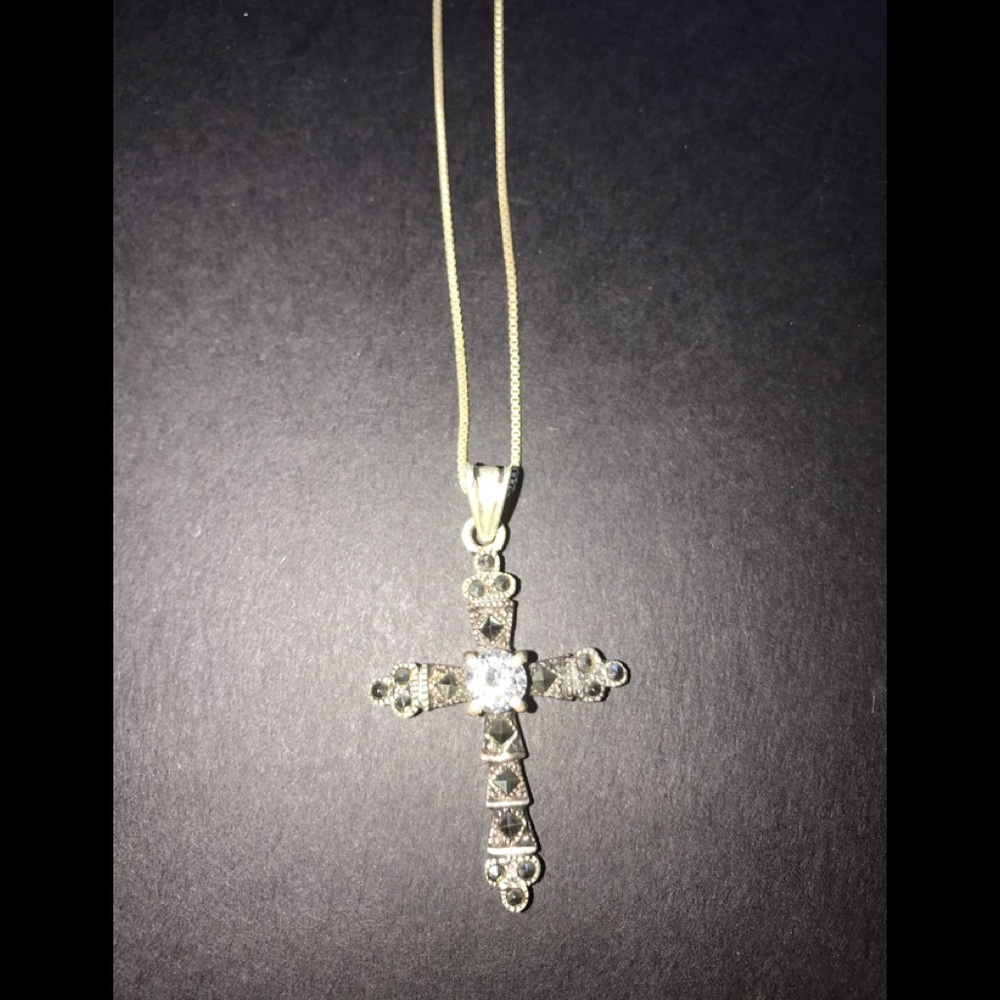 Marcasite cross with crystals in the center